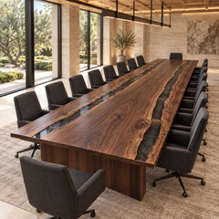 Angled room view of the Obsidianreach rectangular black walnut conference table with black epoxy.